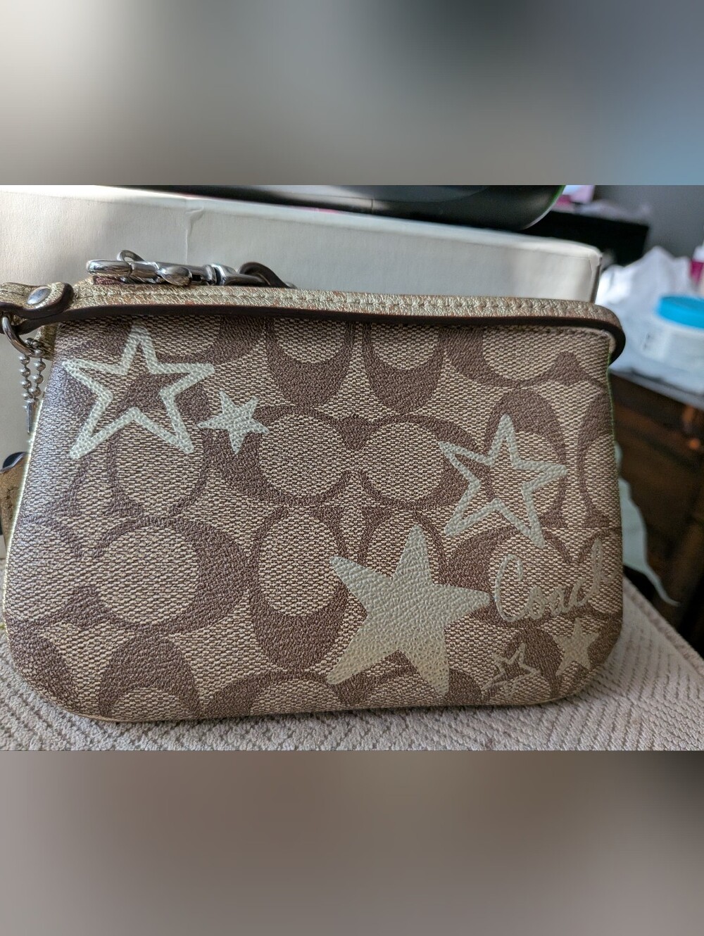 Coach Corner Zip Wristlet in Signature Canvas with Metallic Star Print.